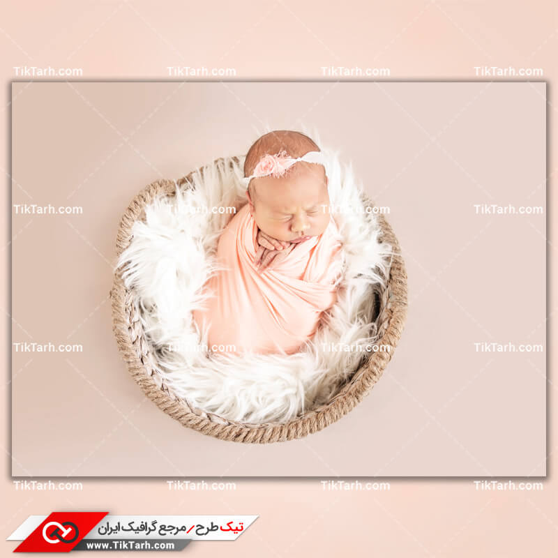 دانلود تصویر با کیفیت کودک خوابیده داخل سبد