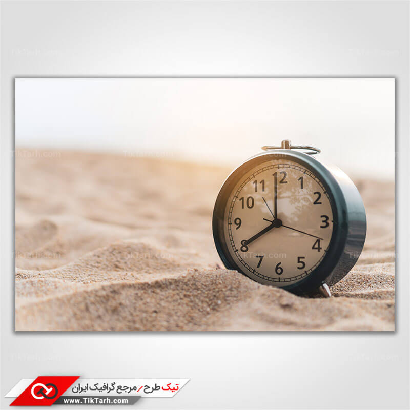دانلود عکس با کیفیت ساعت رومیزی و شن و ماسه