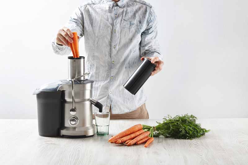 تصویر باکیفیت آب هویج خانگی