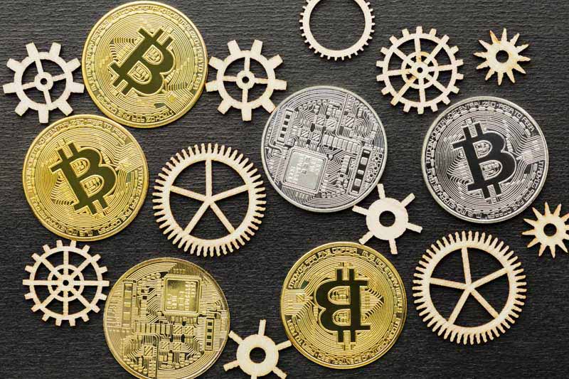 دانلود تصویر سکه های بیت کوین و چرخ دنده ها